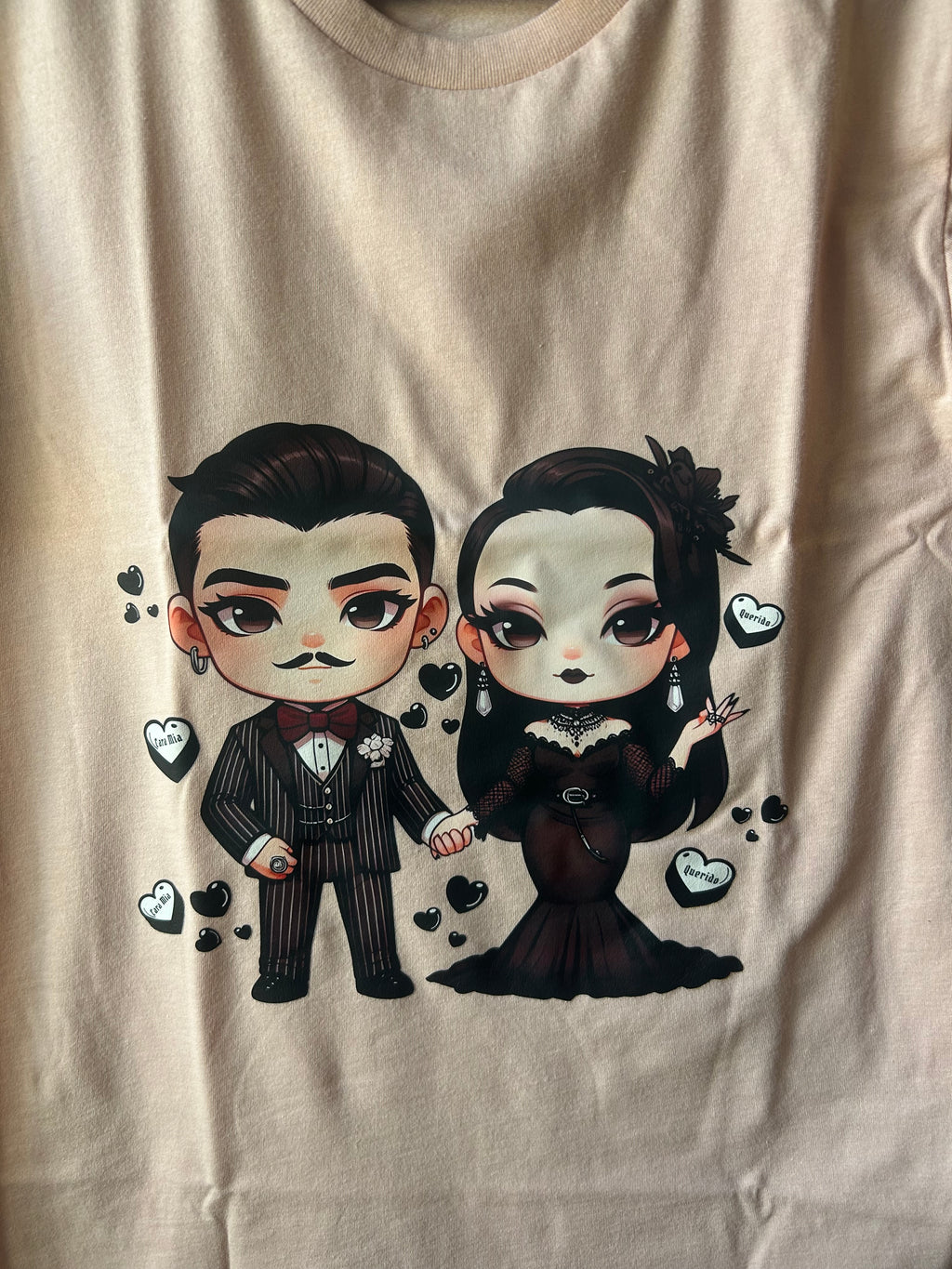 Baby Gomez and Morticia Addams