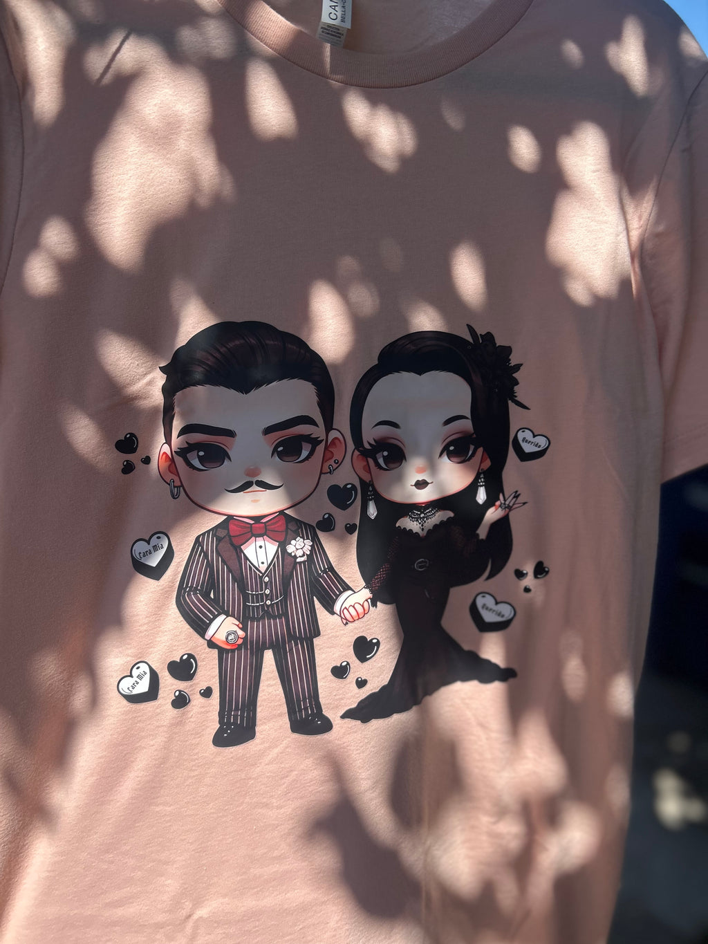 Baby Gomez and Morticia Addams